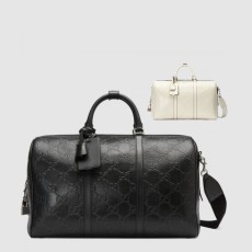 구찌 GG 엠보 더플백 625768