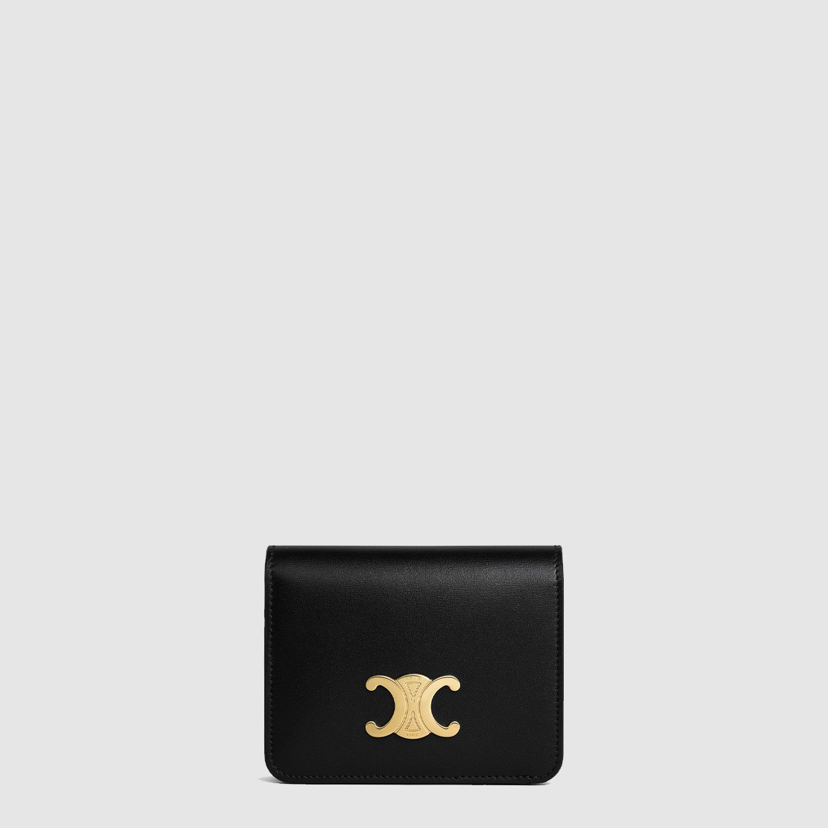 셀린* 트리옹프 컴팩트 지갑 10K623DPV