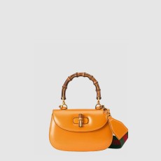 구찌 뱀부 스몰 탑 핸들백 675797